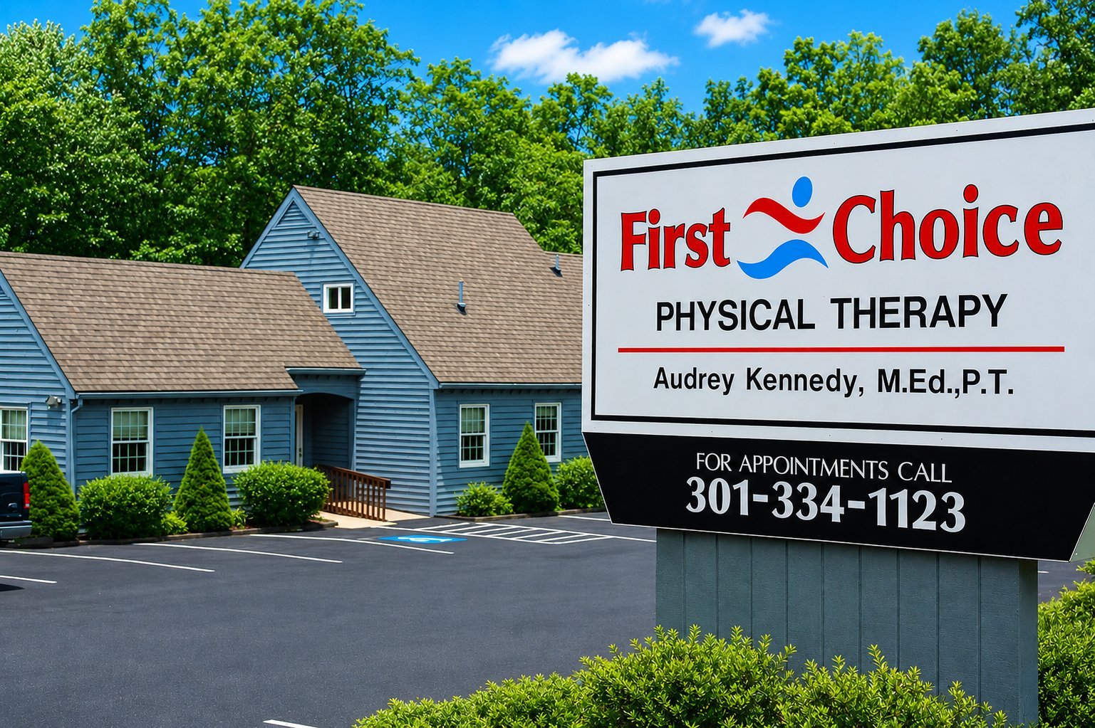 First Choice Physical Therapy building with exterior sign showing business name, therapist Audrey Kennedy M.Ed., P.T., and phone number 301-334-1123